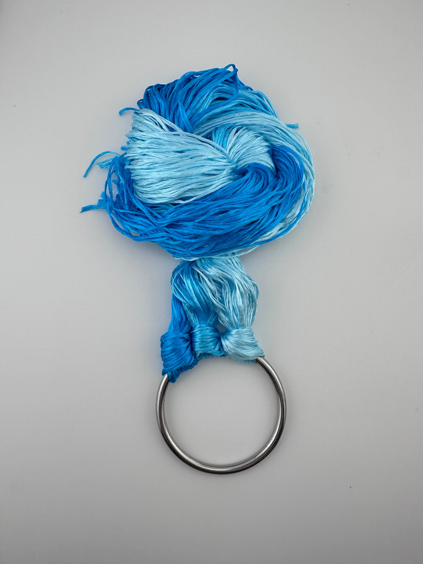 Slightly twisted mulberry silk threads for making velvet flowers